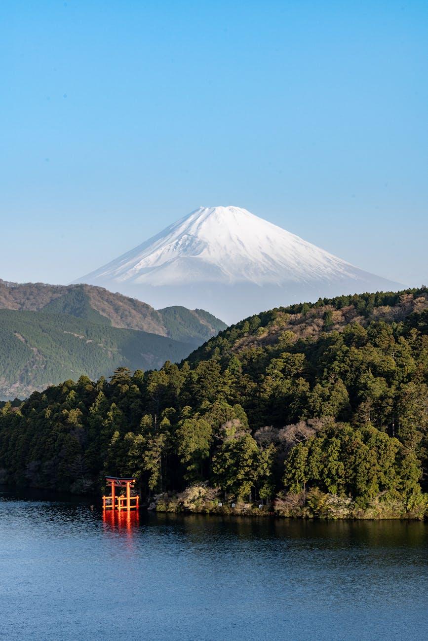 Stunning view of Mount Fuji with a red torii gate on Lake Ashi in Hakone, Japan