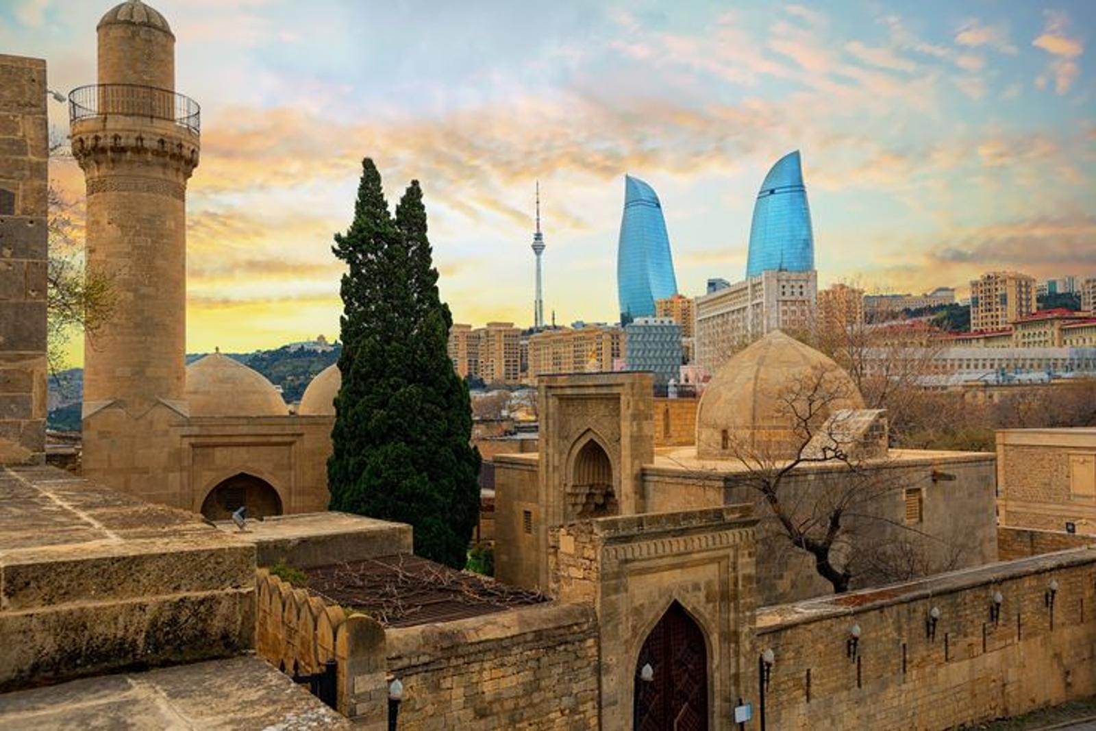 Modern Baku skyline along the Caspian at dusk