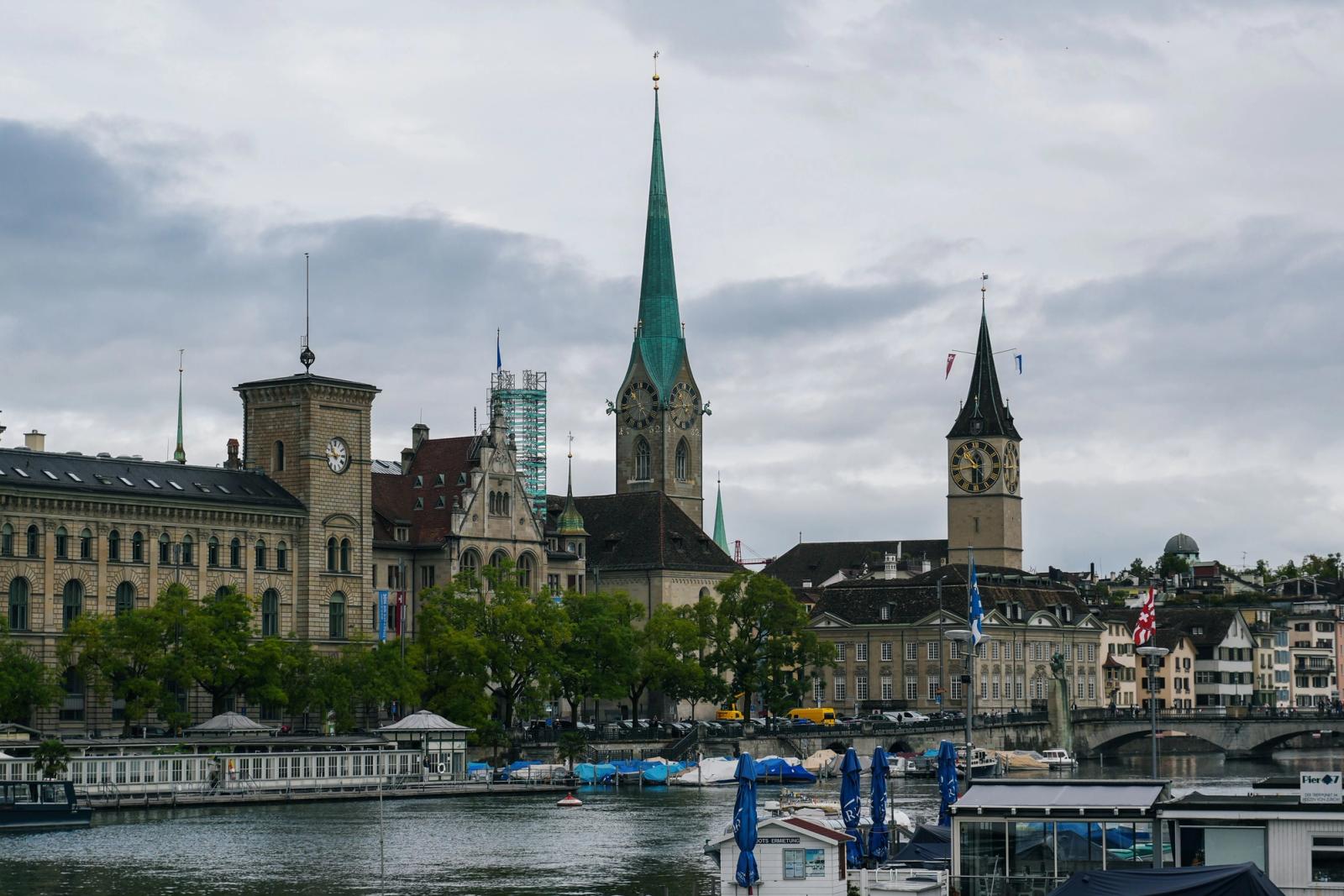 Scenic view of Zürich with church towers and river on a cloudy day