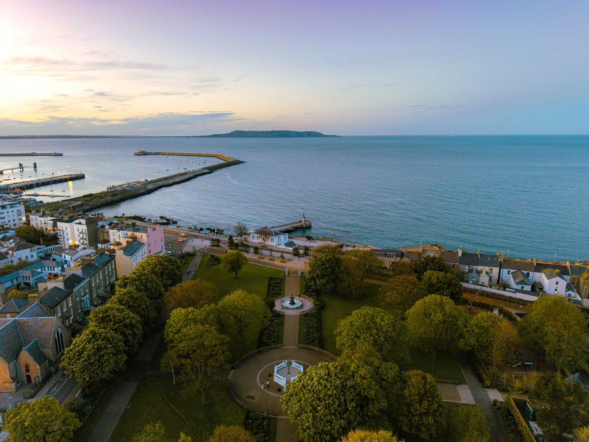 Serene aerial view of Dun Laoghaire harbor and park at twilight in Dublin, Ireland