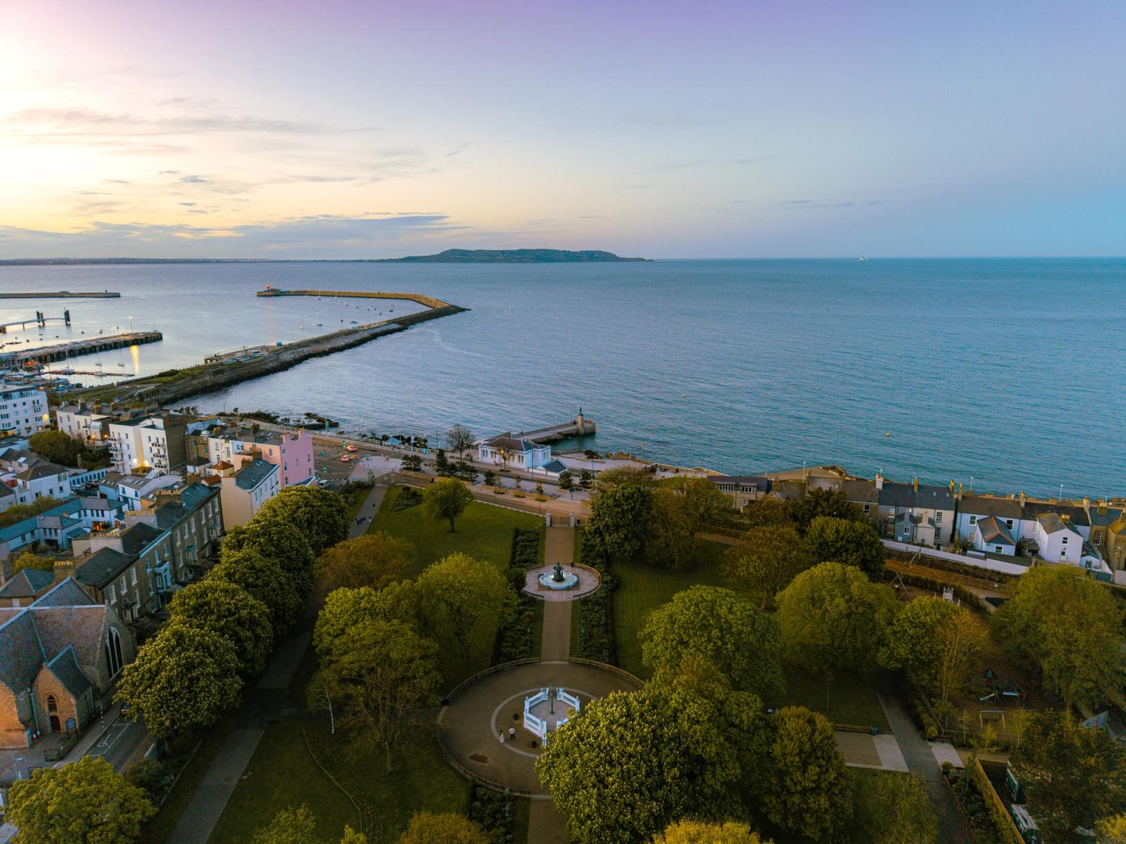 Serene aerial view of Dun Laoghaire harbor and park at twilight in Dublin, Ireland