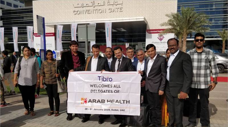 People at the Tibro event, posing together.