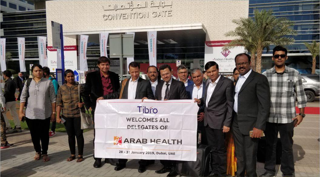 People at the Tibro event, posing together.
