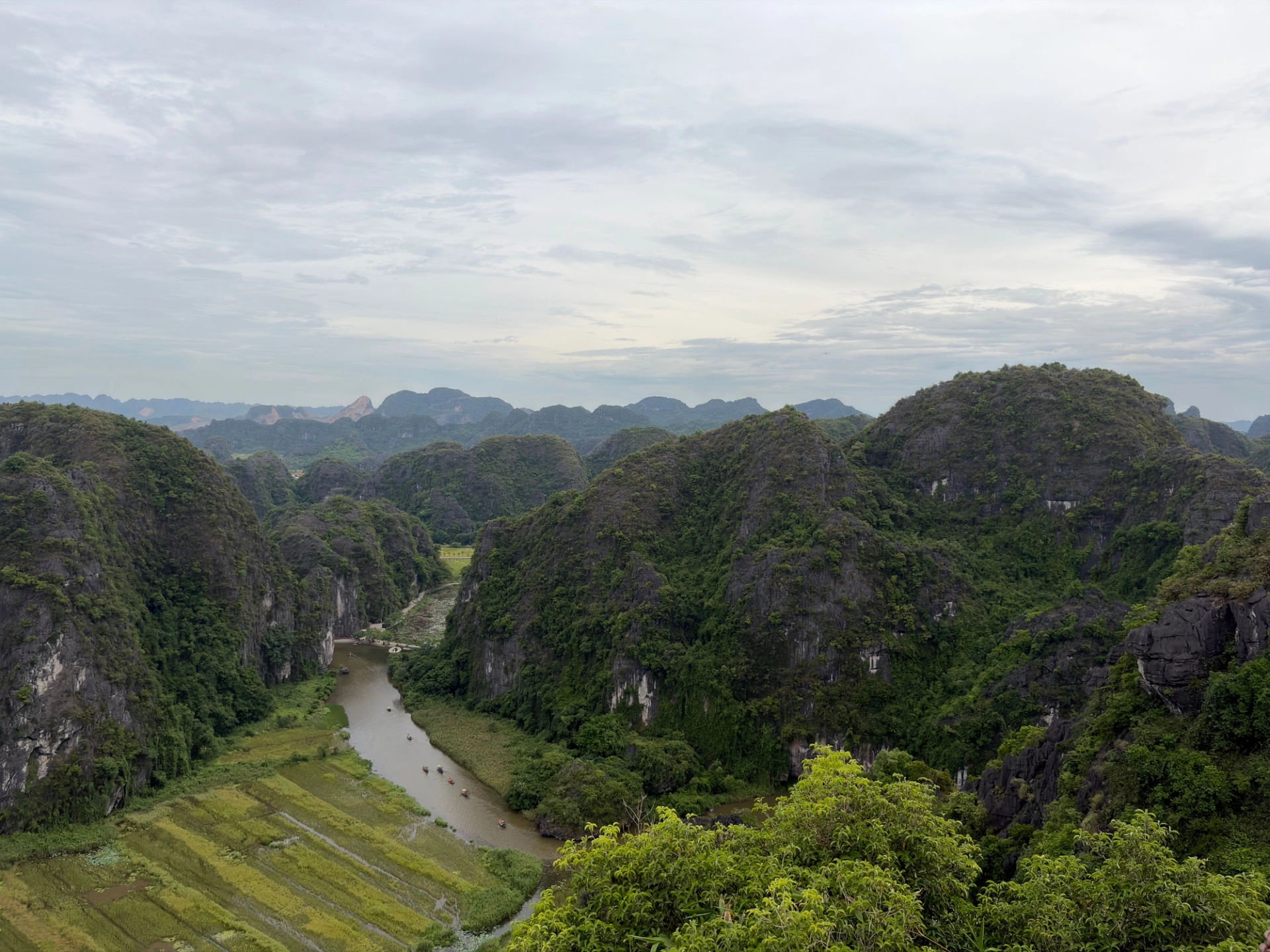 Explore Vietnam's stunning limestone karsts and lush landscapes from above