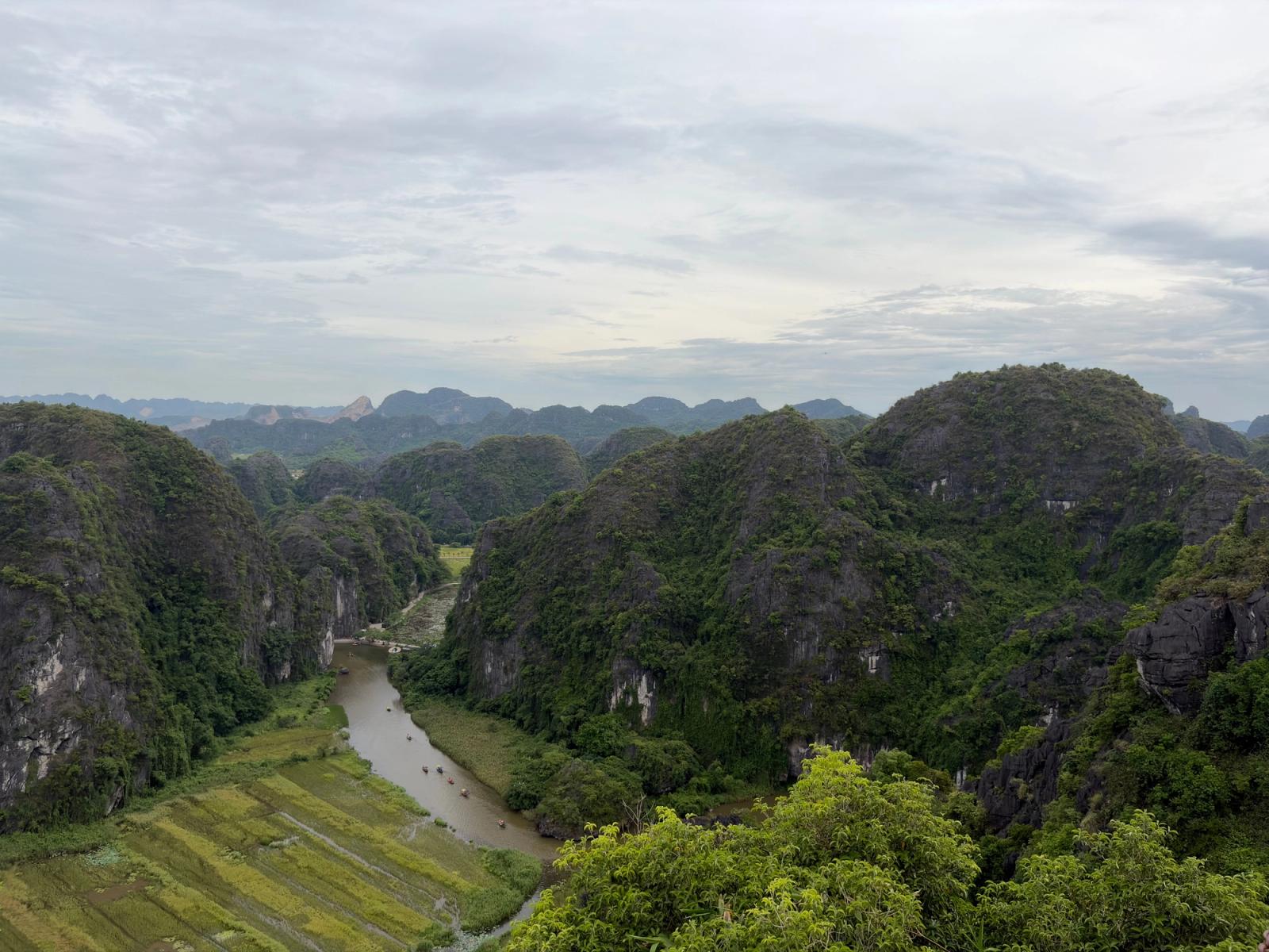 Explore Vietnam's stunning limestone karsts and lush landscapes from above