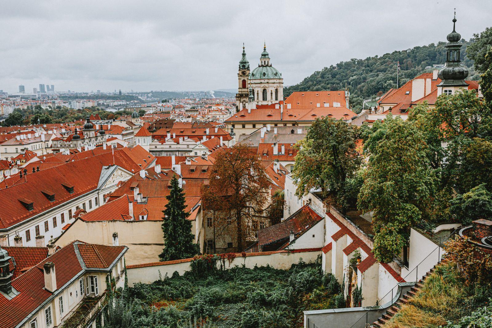 Malá Strana’s red rooftops with the dome of St Nicholas, Prague