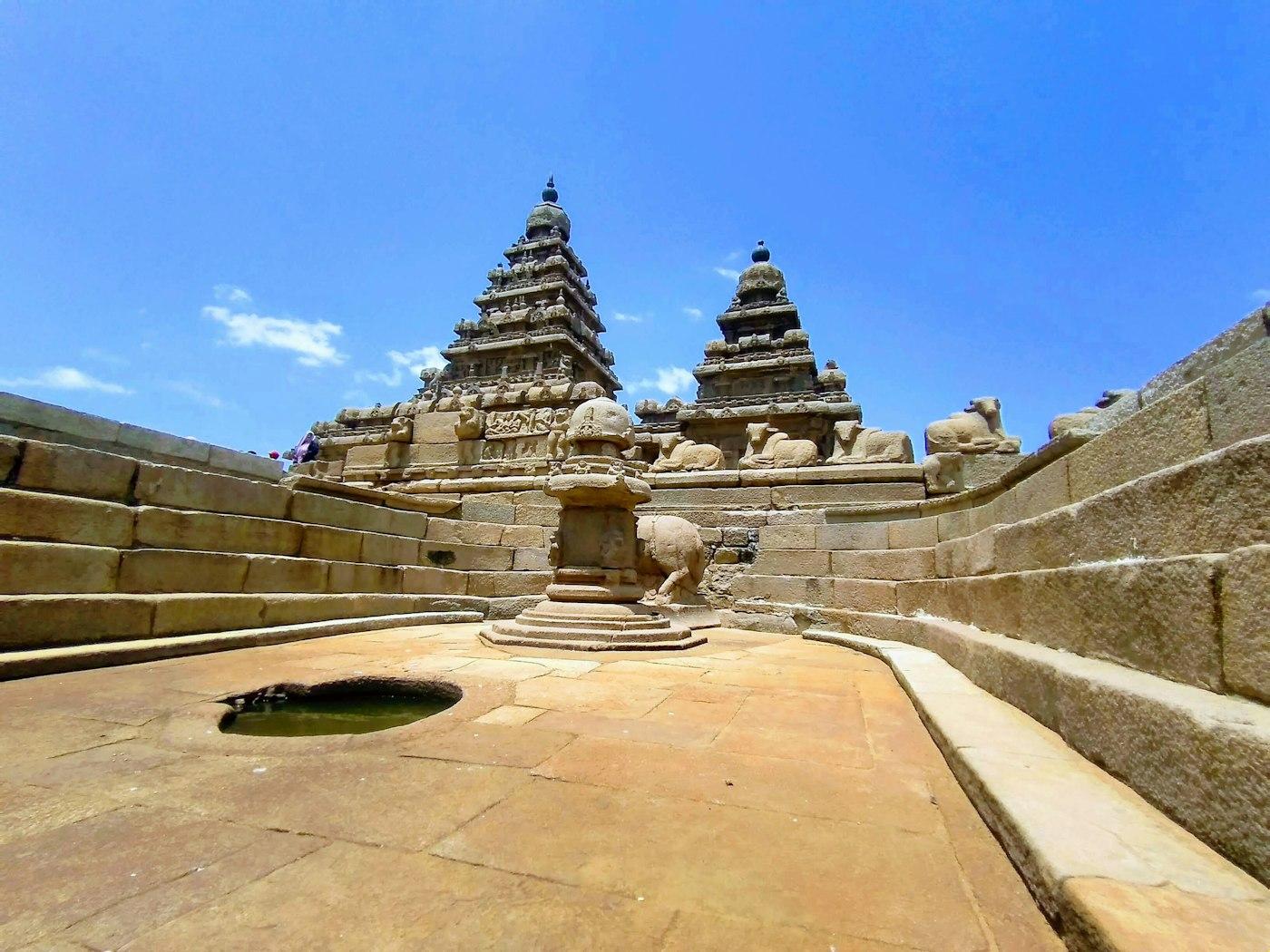 The seventh-century Shore Temple standing against the Bay of Bengal at Mahabalipuram