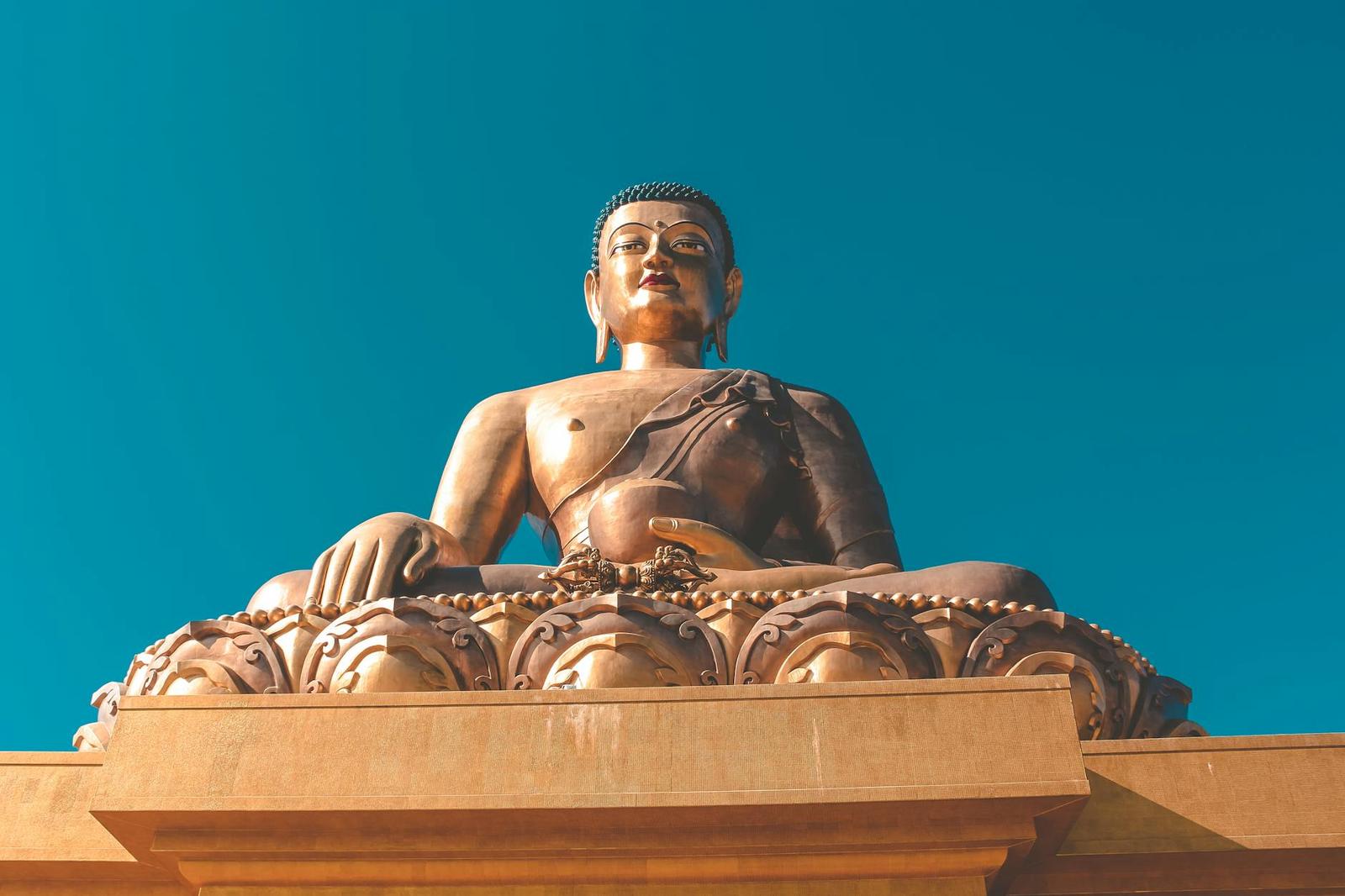 Stunning view of the Buddha Dordenma statue under a clear blue sky in Bhutan