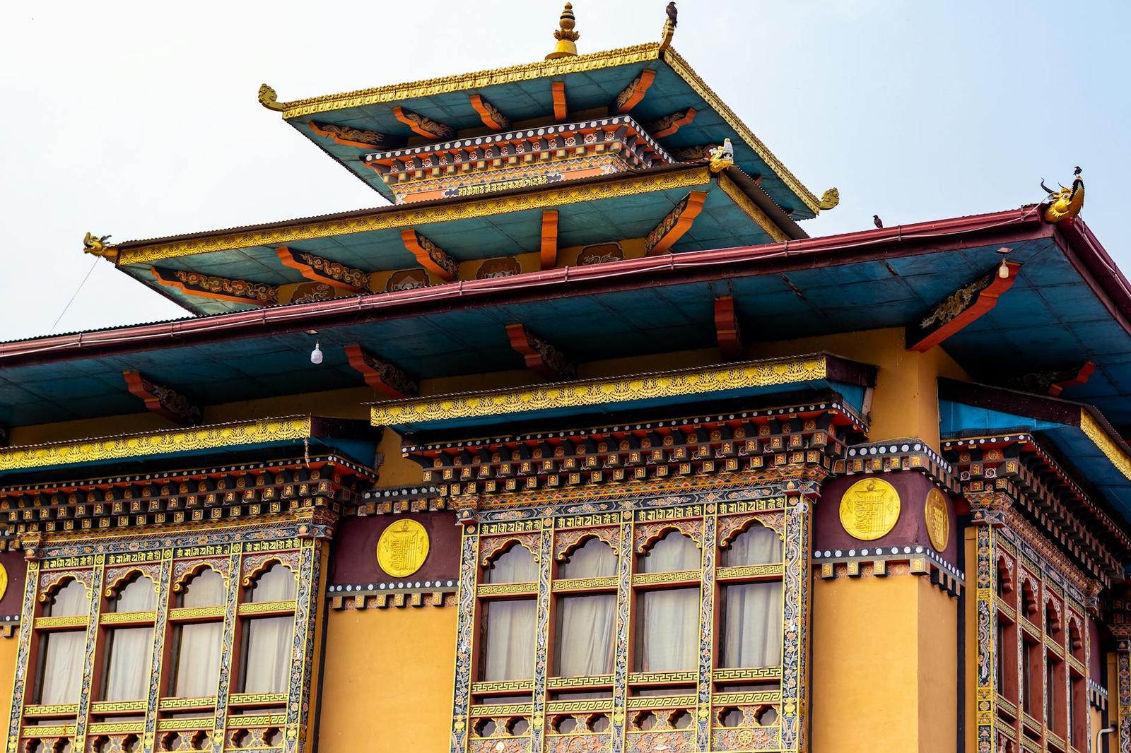 Explore the intricate and colorful facade of a Bhutanese temple in Phuentsholing, Bhutan