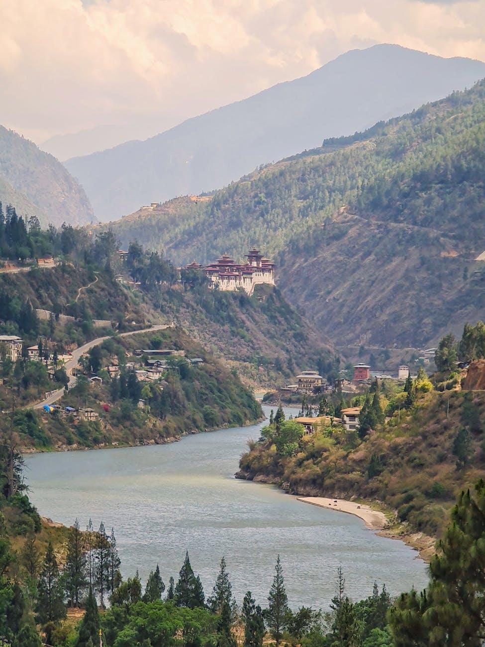 A stunning view of Wangdue Phodrang Monastery amidst the serene Bhutanese valley and river