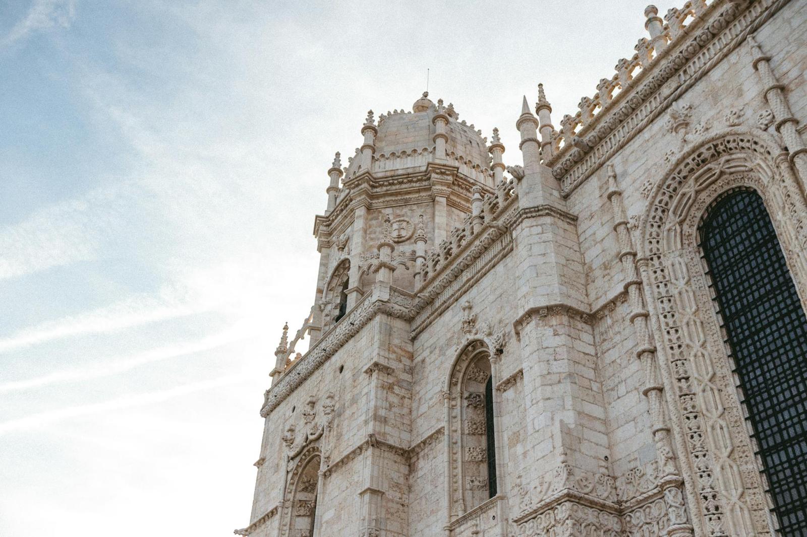 Stunning view of Jerónimos Monastery showcasing Gothic architecture in Lisbon, Portugal