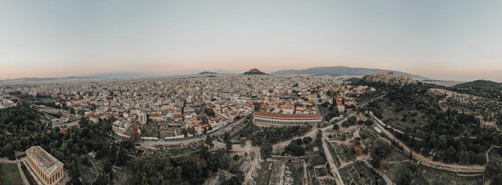 A stunning aerial view of Athens cityscape at sunrise
