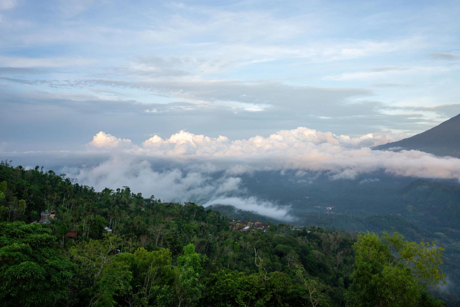 Breathtaking view of mountains and clouds in Bali, Indonesia during daytime