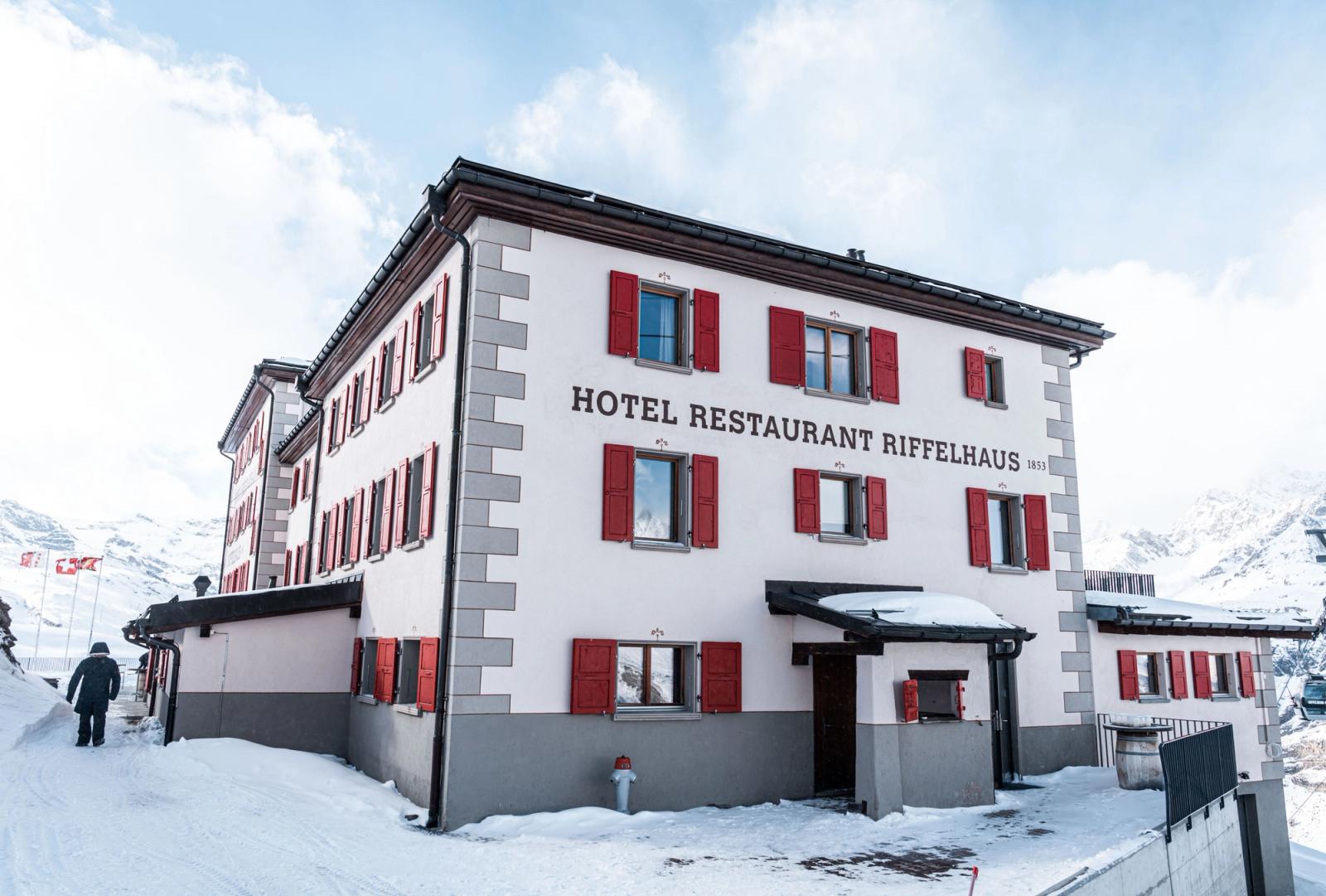 Scenic view of Hotel Riffelhaus 1853 nestled in the snowy Swiss Alps