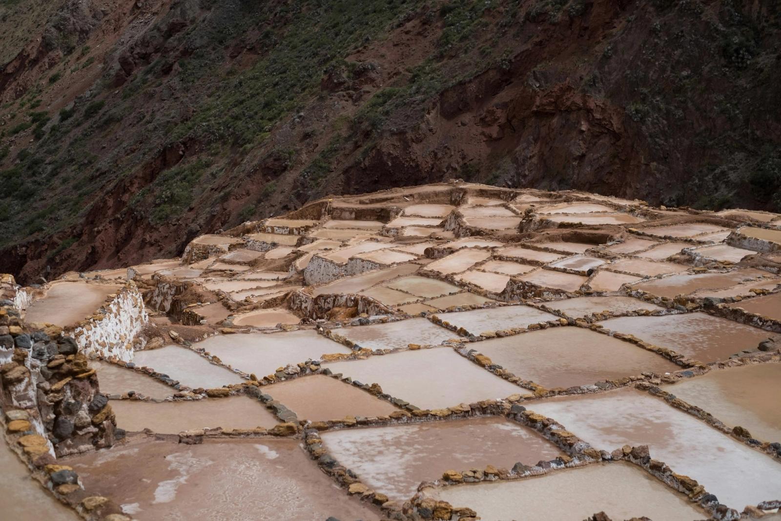 Terraced salt pans cut into a steep hillside