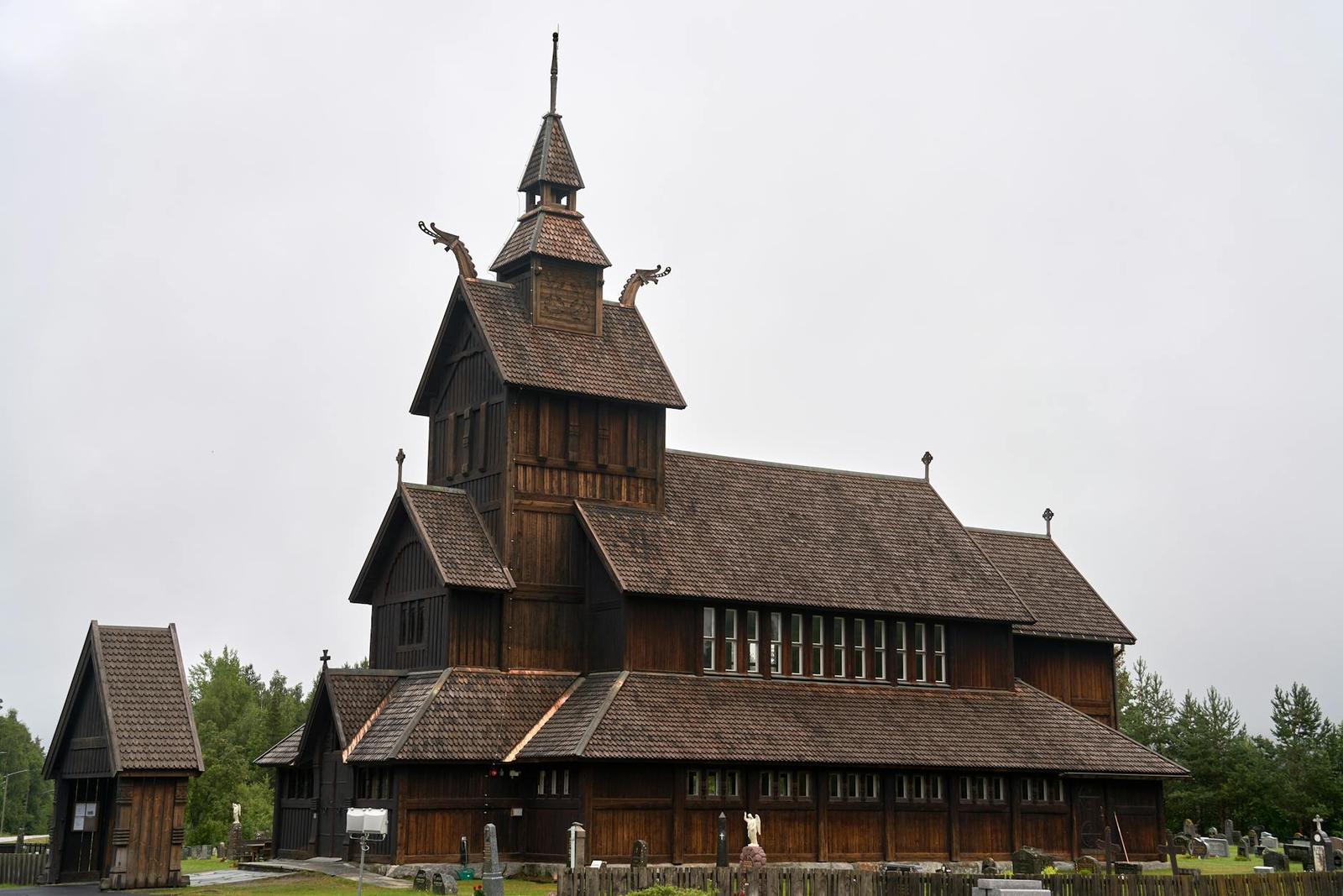 Historic Uvdal Stave Church in Uvdal, Norway, exemplifies medieval architecture amidst a serene winter landscape