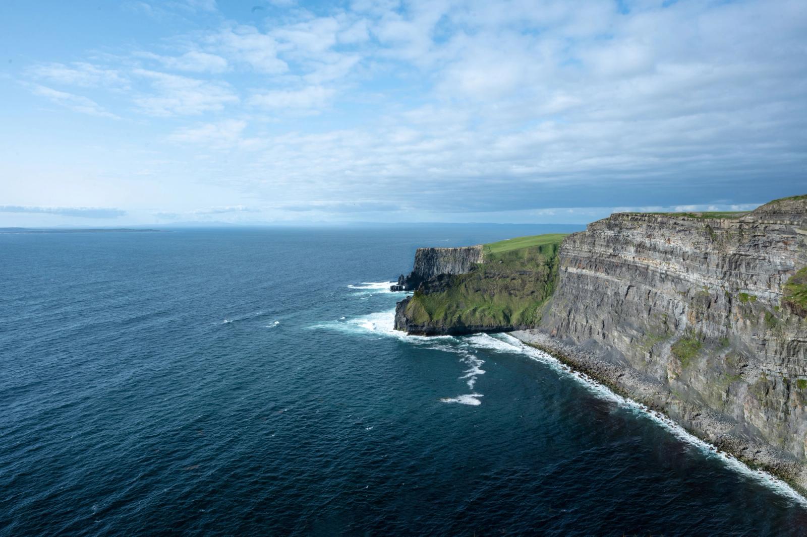 Stunning aerial capture of the Cliffs of Moher and the Atlantic Ocean in Ireland