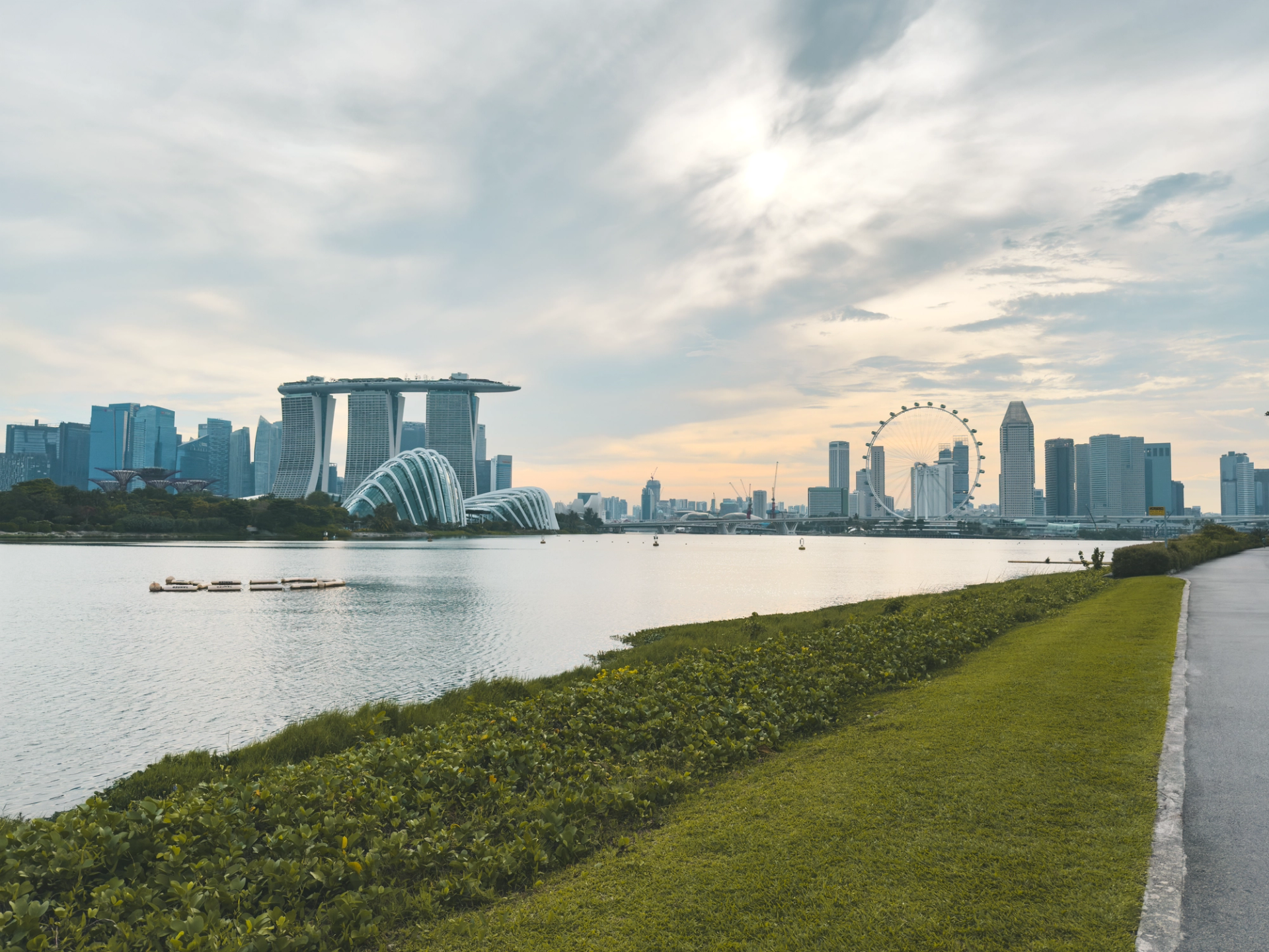The iconic Singapore skyline featuring Marina Bay Sands and the Singapore Flyer at sunset