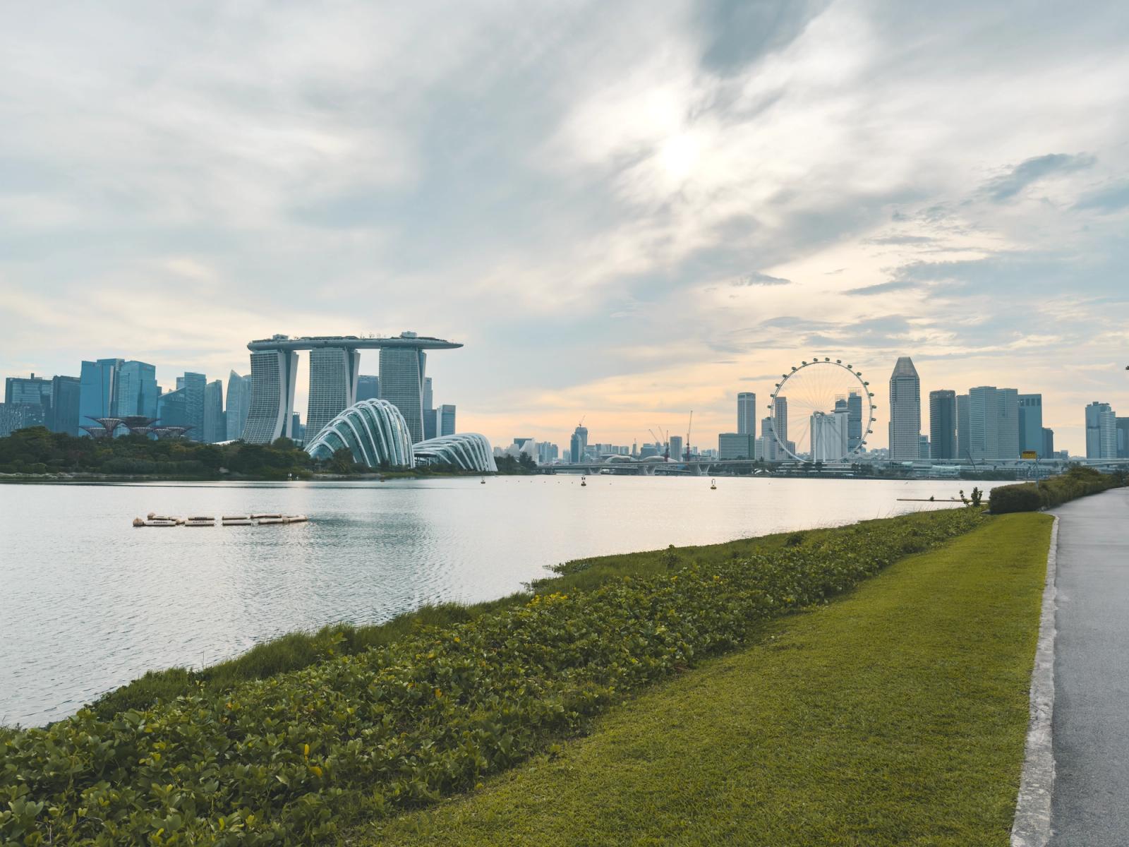 The iconic Singapore skyline featuring Marina Bay Sands and the Singapore Flyer at sunset