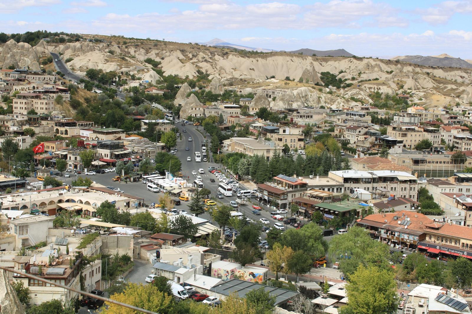 A panoramic view of Göreme, Turkey showcasing unique rock formations and traditional architecture