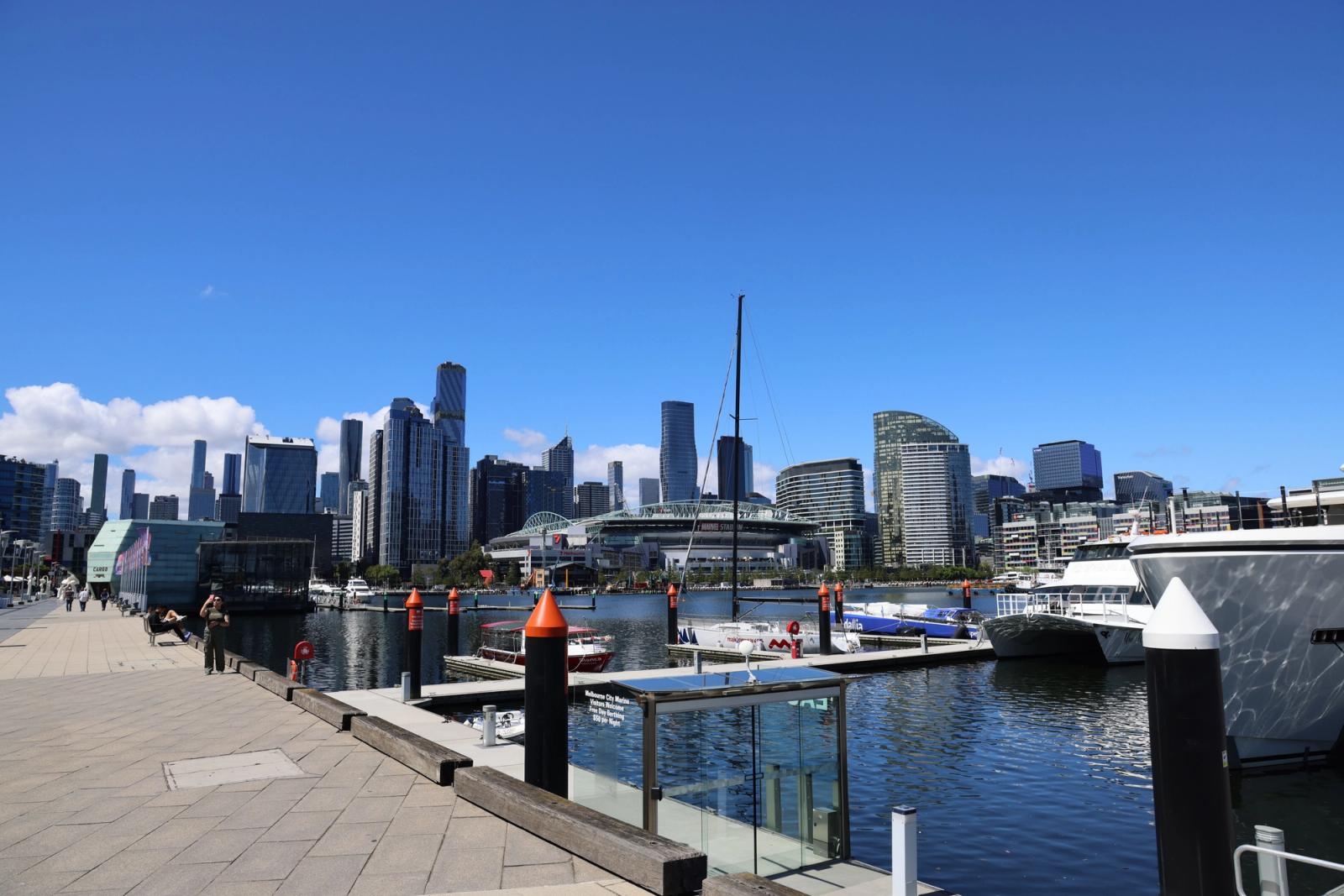 Explore Melbourne's modern skyline and scenic waterfront on a clear sunny day