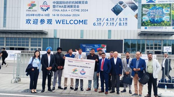 Group posing outside the CITME 2024 event venue.