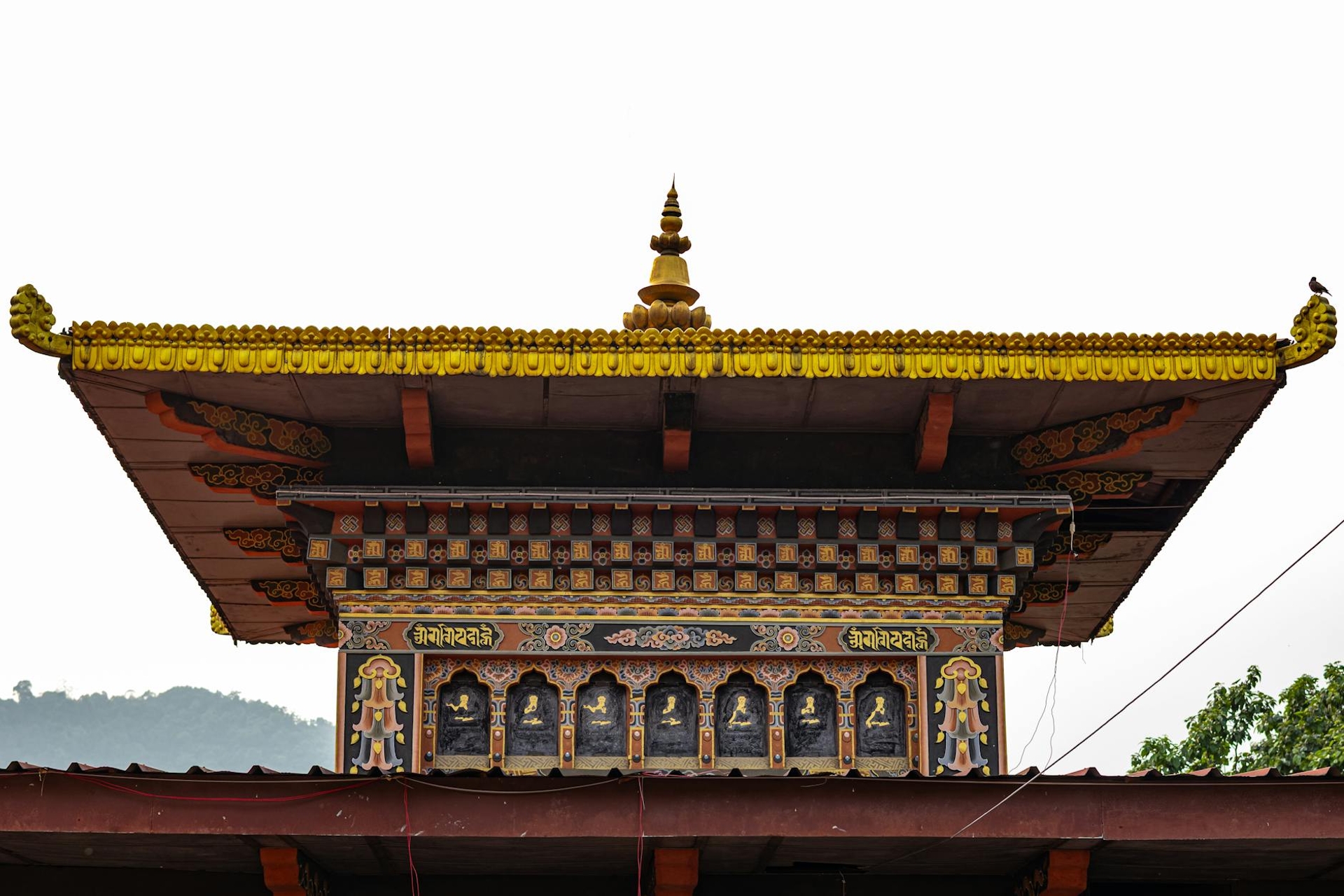 Captivating Bhutanese temple roof showcasing intricate architecture in Phuentsholing