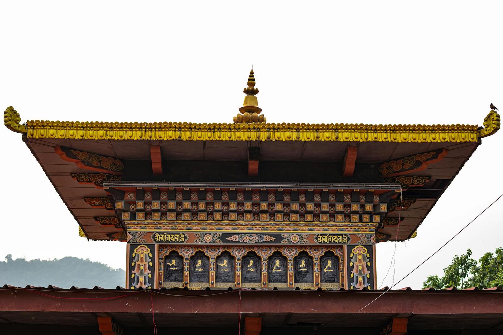 Captivating Bhutanese temple roof showcasing intricate architecture in Phuentsholing
