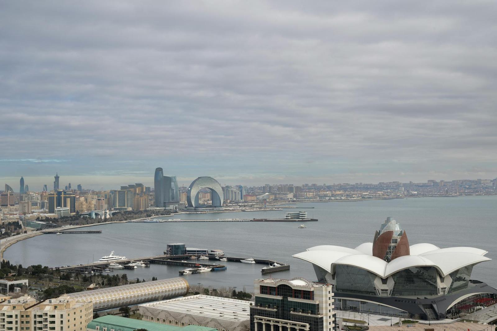 Scenic aerial view of Baku, Azerbaijan overlooking the Caspian Sea with iconic architecture and urban landscape