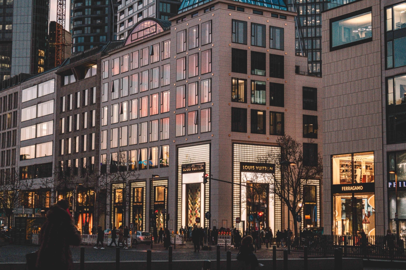 Vibrant cityscape of Frankfurt, showcasing modern architecture and bustling evening life