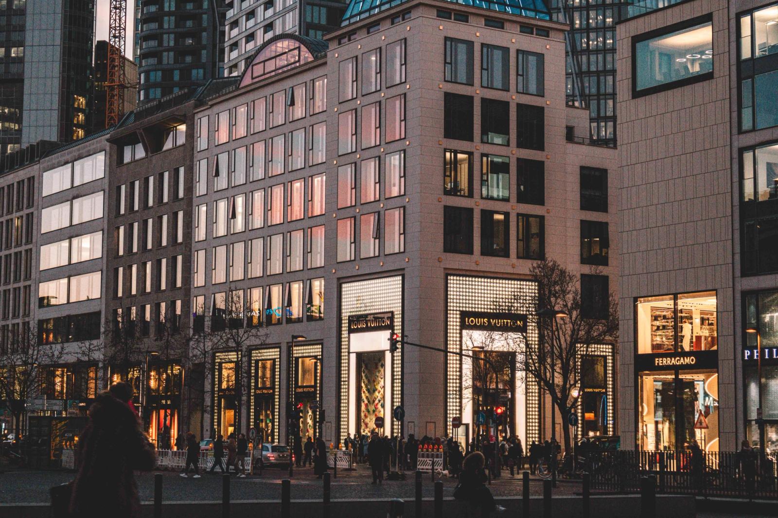 Vibrant cityscape of Frankfurt, showcasing modern architecture and bustling evening life