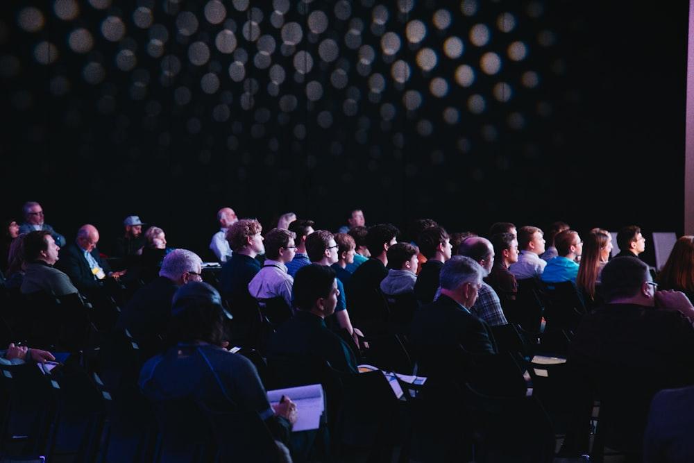 Corporate conference plenary in a resort ballroom
