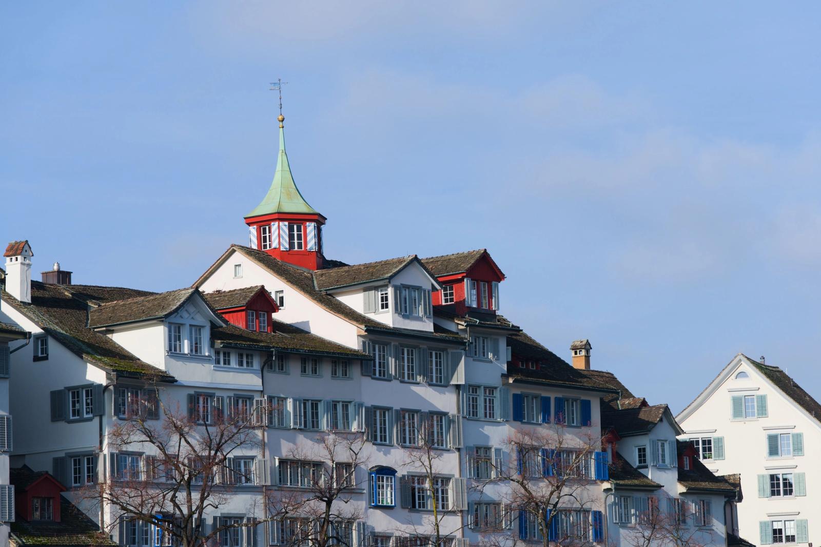 Traditional Swiss buildings in Zurich showcasing picturesque architecture under a clear sky