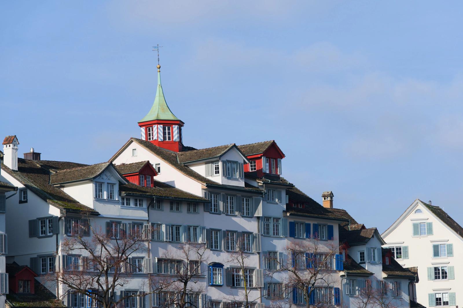 Traditional Swiss buildings in Zurich showcasing picturesque architecture under a clear sky