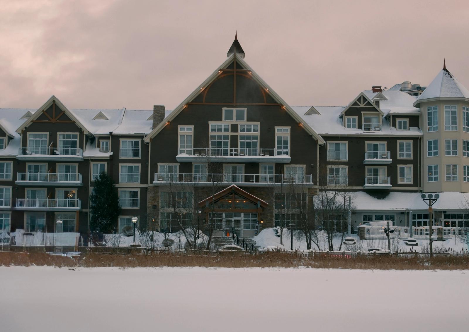 A picturesque snow-covered resort at Blue Mountain, Ontario, Canada under a winter sky