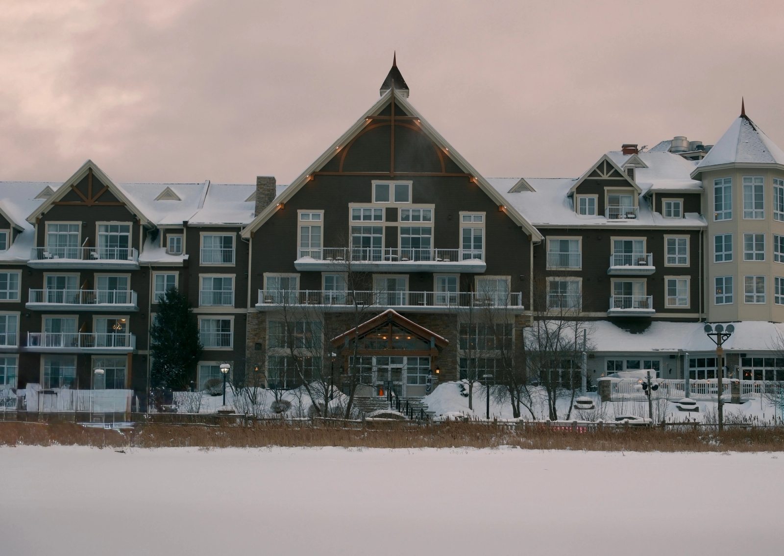 A picturesque snow-covered resort at Blue Mountain, Ontario, Canada under a winter sky