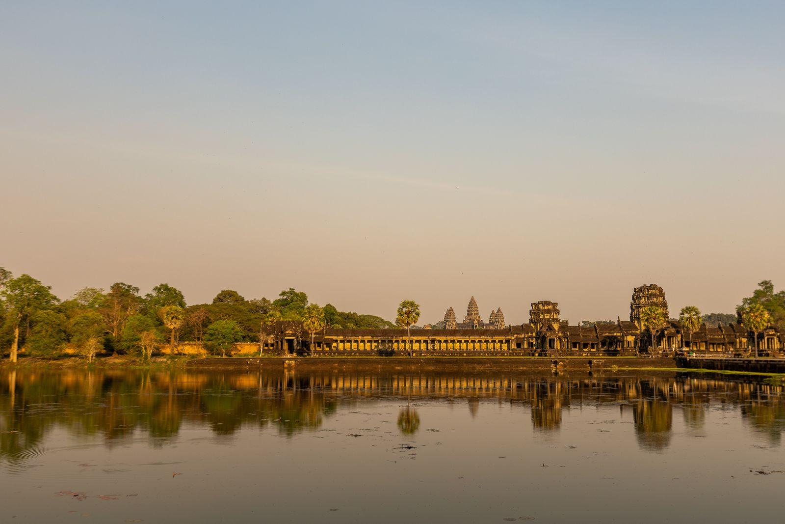 Angkor Wat mirrored in its moat at sunrise, Siem Reap