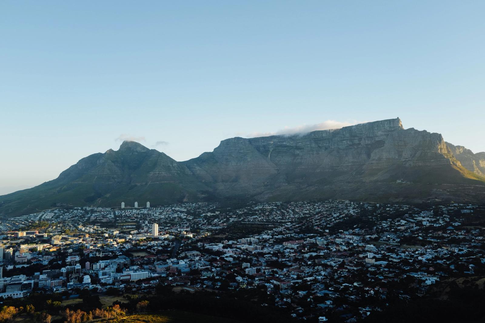 Stunning aerial view of Cape Town cityscape with Table Mountain in the background at daytime