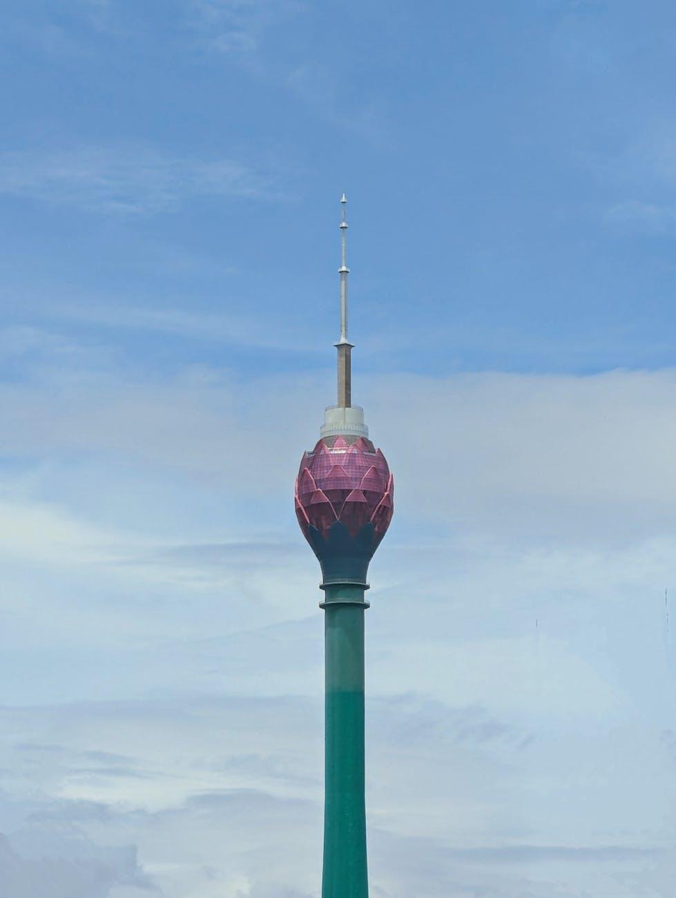 Stunning view of the Lotus Tower in Colombo, Sri Lanka with a bright blue sky in the background