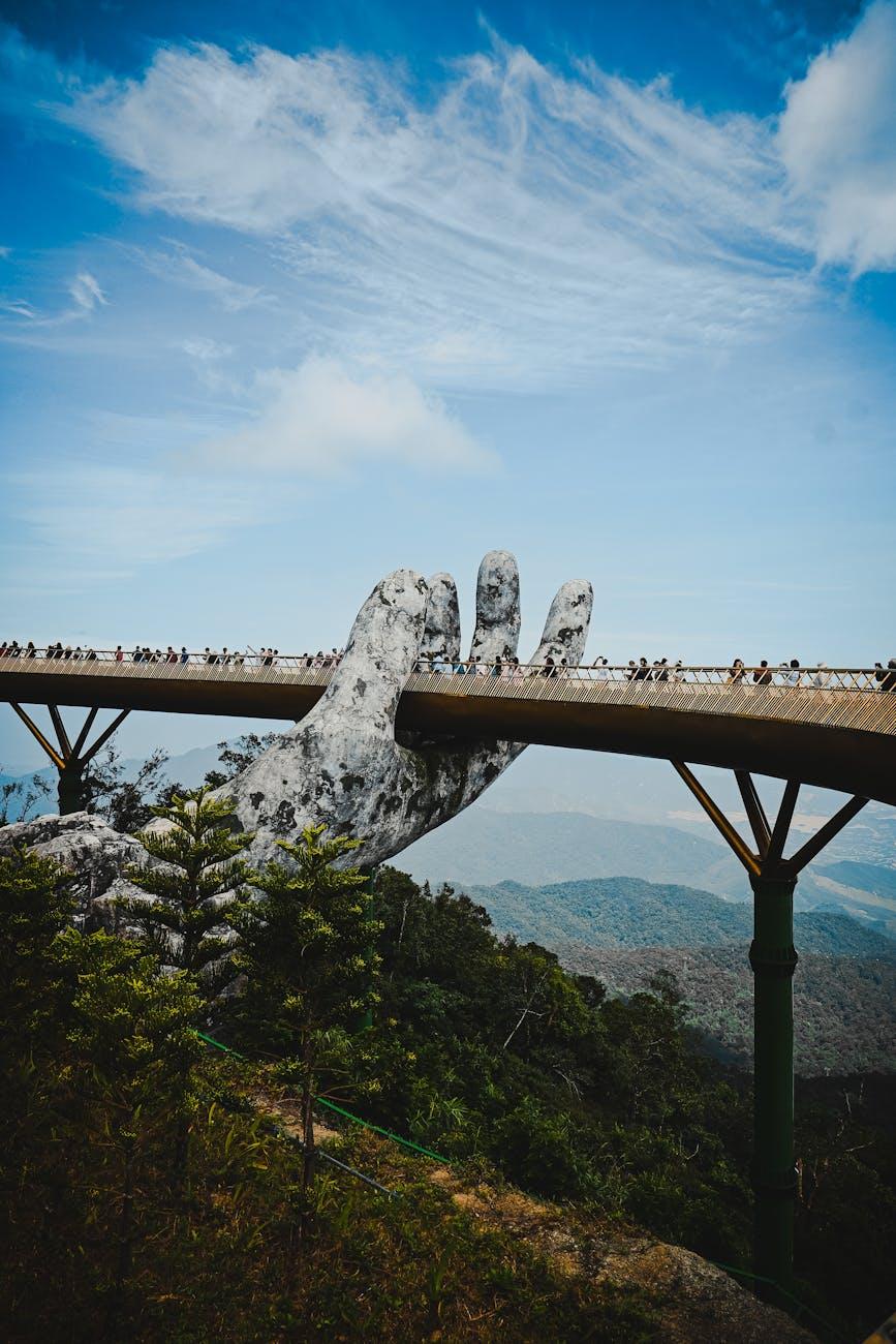 The iconic Golden Bridge held by giant hands at Ba Na Hills, Da Nang