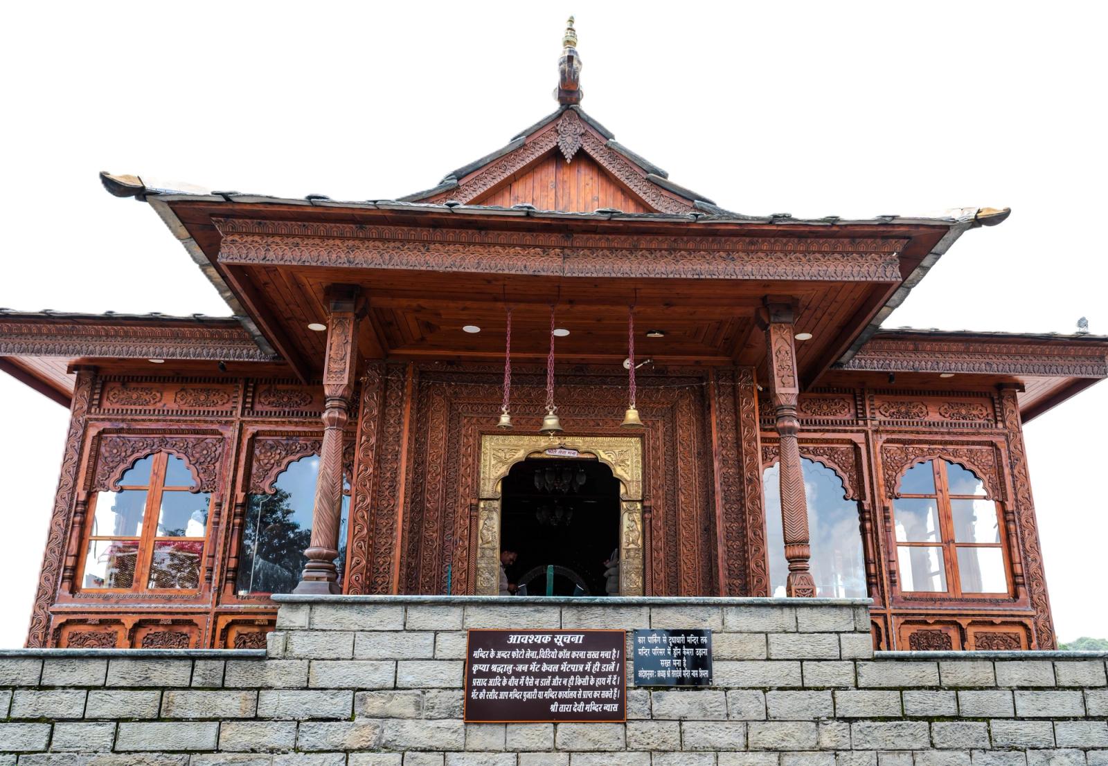 Beautifully carved wooden temple facade in Shimla, Himachal Pradesh, India
