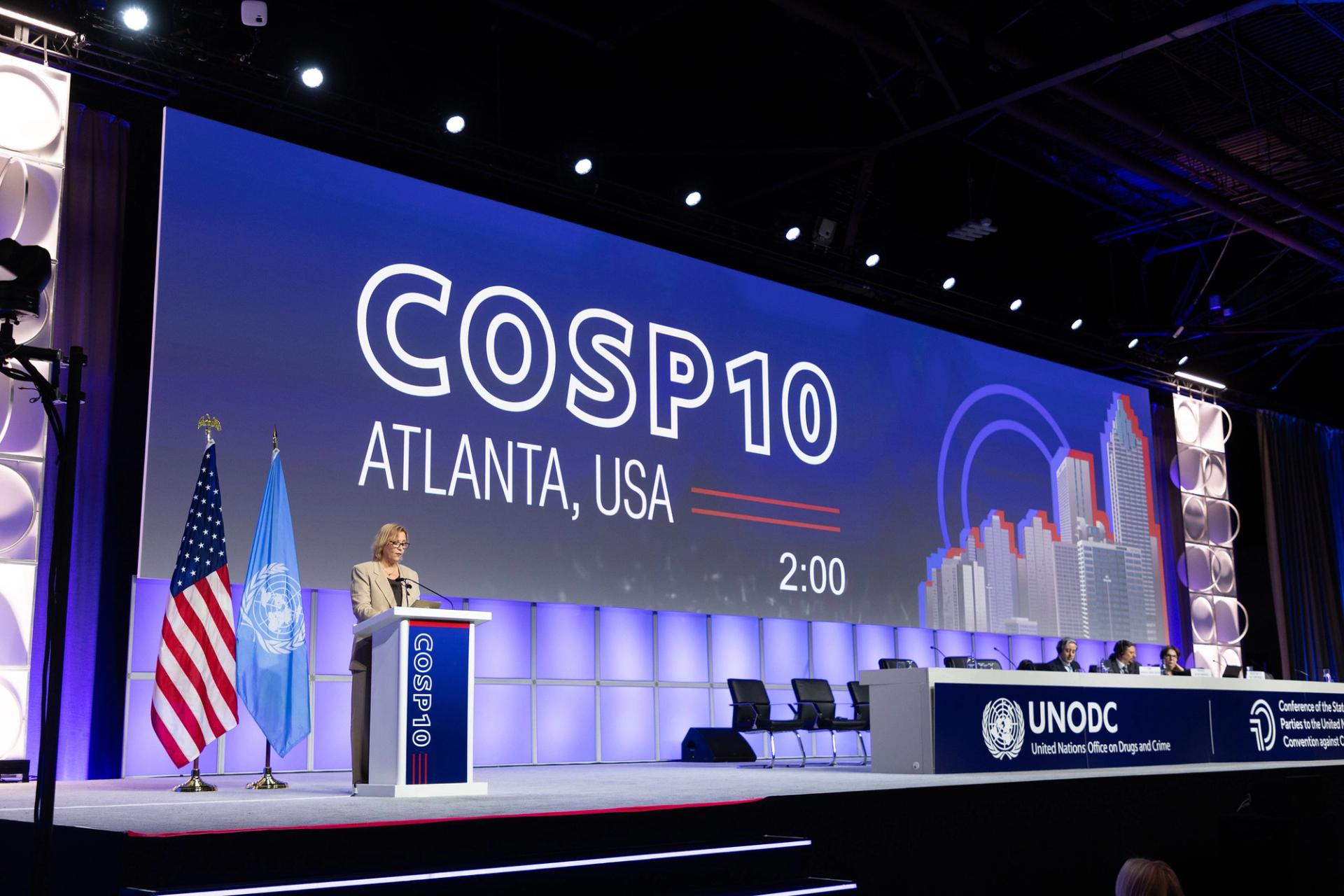 A female speaker at the podium of a General Session at the December 2023 Conference of States Parties to the UN Convention against Corruption, Atlanta, USA.