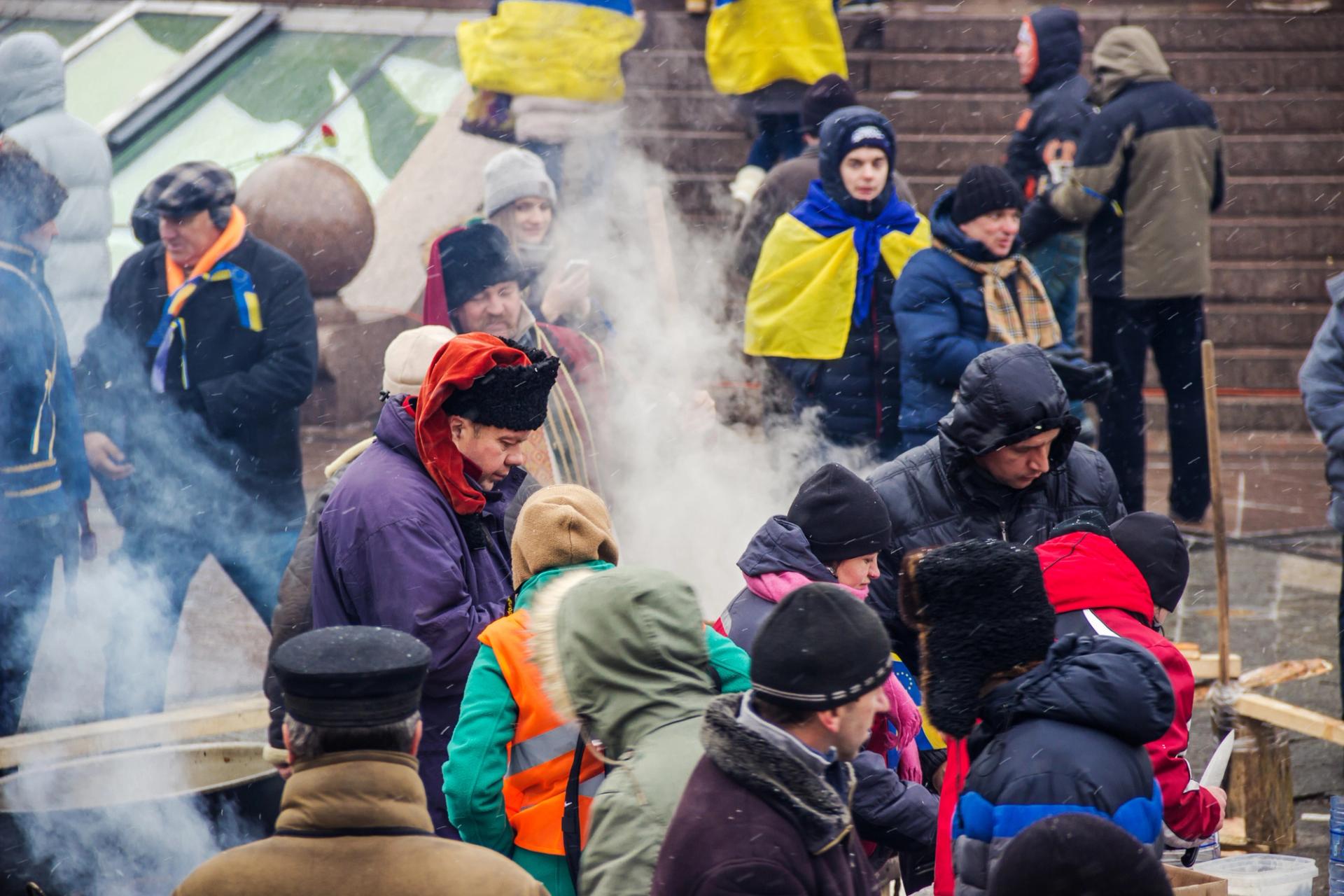 Kyiv, Ukraine, December 8, 2013: people on Maidan during a rally for the European integration and the government's resignation on Independence Square in downtown Kiev.