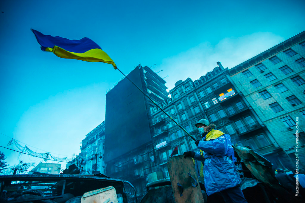Man waving a Ukrainian flag