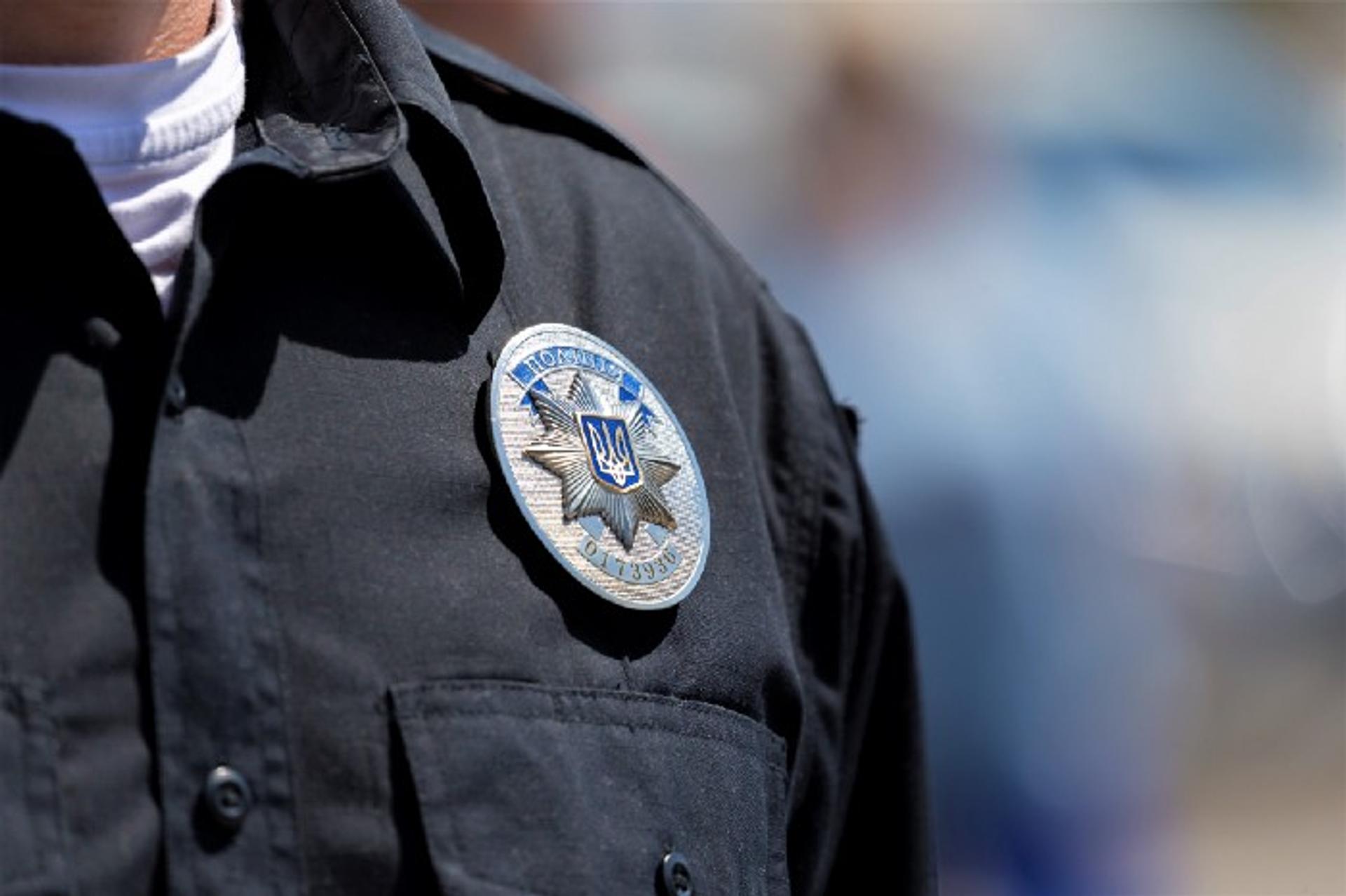 Close up of a Ukrainian police uniform badge