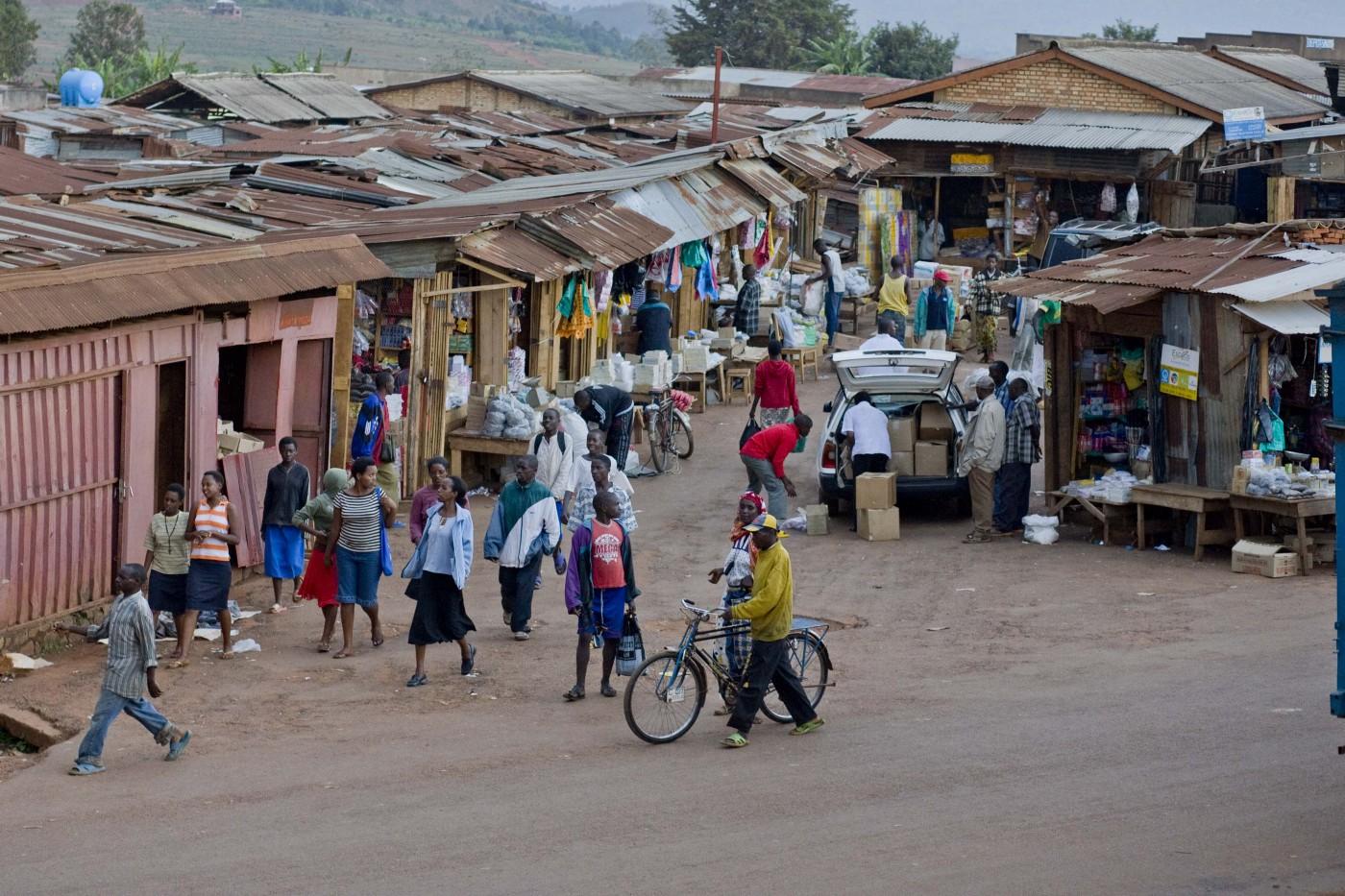 Bustling street with market vendors