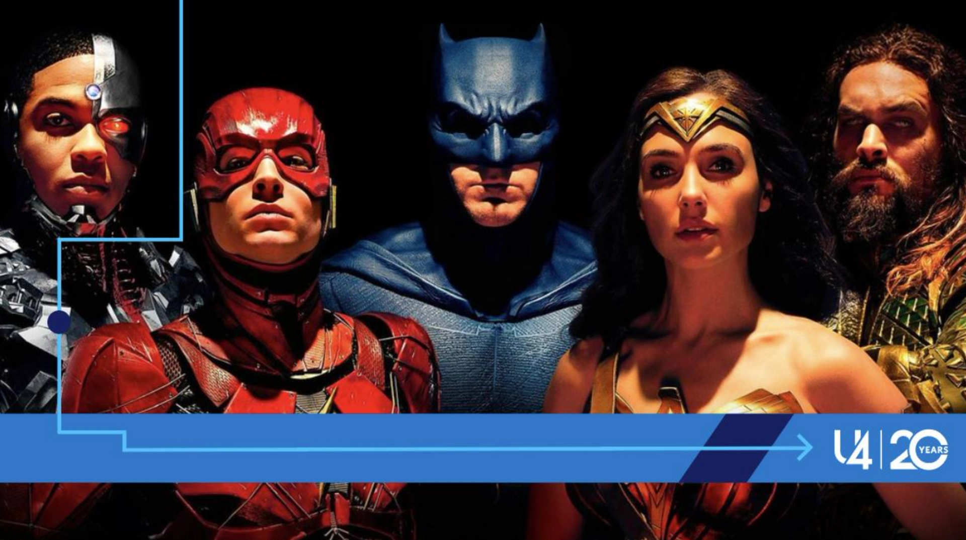 A close-up photo of five people dressed as superheroes, showing heads and torsos