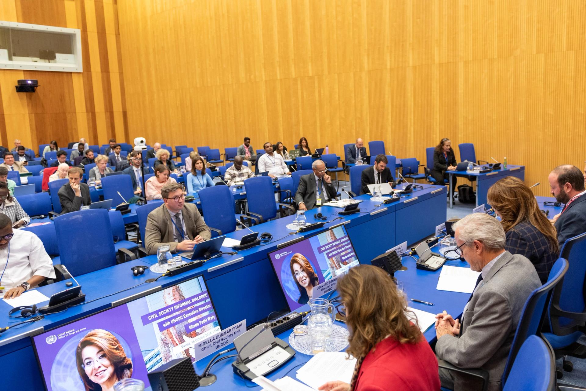 A conference room at the United Nations with a meeting in progress.