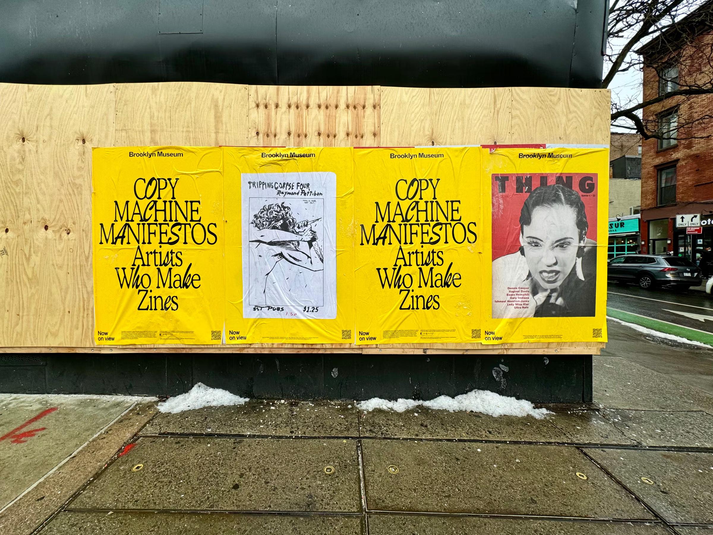 Four yellow posters for Brooklyn Museum's "Copy Machine Manifestos" exhibition on plywood.