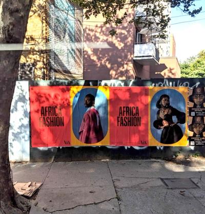 Red posters with "AFRICA FASHION" and models, Brooklyn Museum, V&A logo.